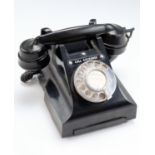 A 1950s GPO black Bakelite telephone, (a/f)