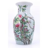 A large contemporary Japanese vase decorated in depiction of peaches, 38 cm