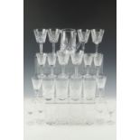 A group of Waterford Crystal "Lismore" pattern table glass, including a water jug, wine glasses,