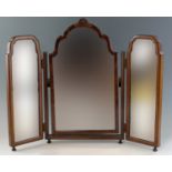 A 1930s Queen Anne style walnut framed triptych dressing table mirror, 61 cm high