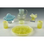 A group of late Victorian pressed yellow and blue opaline glass, together with a free blown