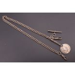 An early 20th Century curb link silver Albert watch chain, having a sliding T bar Albert