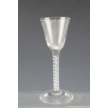 A mid 18th Century wine glass having a double spiral air twist stem, 15.5 cm
