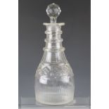 A Regency facet-cut triple-ring glass decanter (with associated stopper), 27 cm