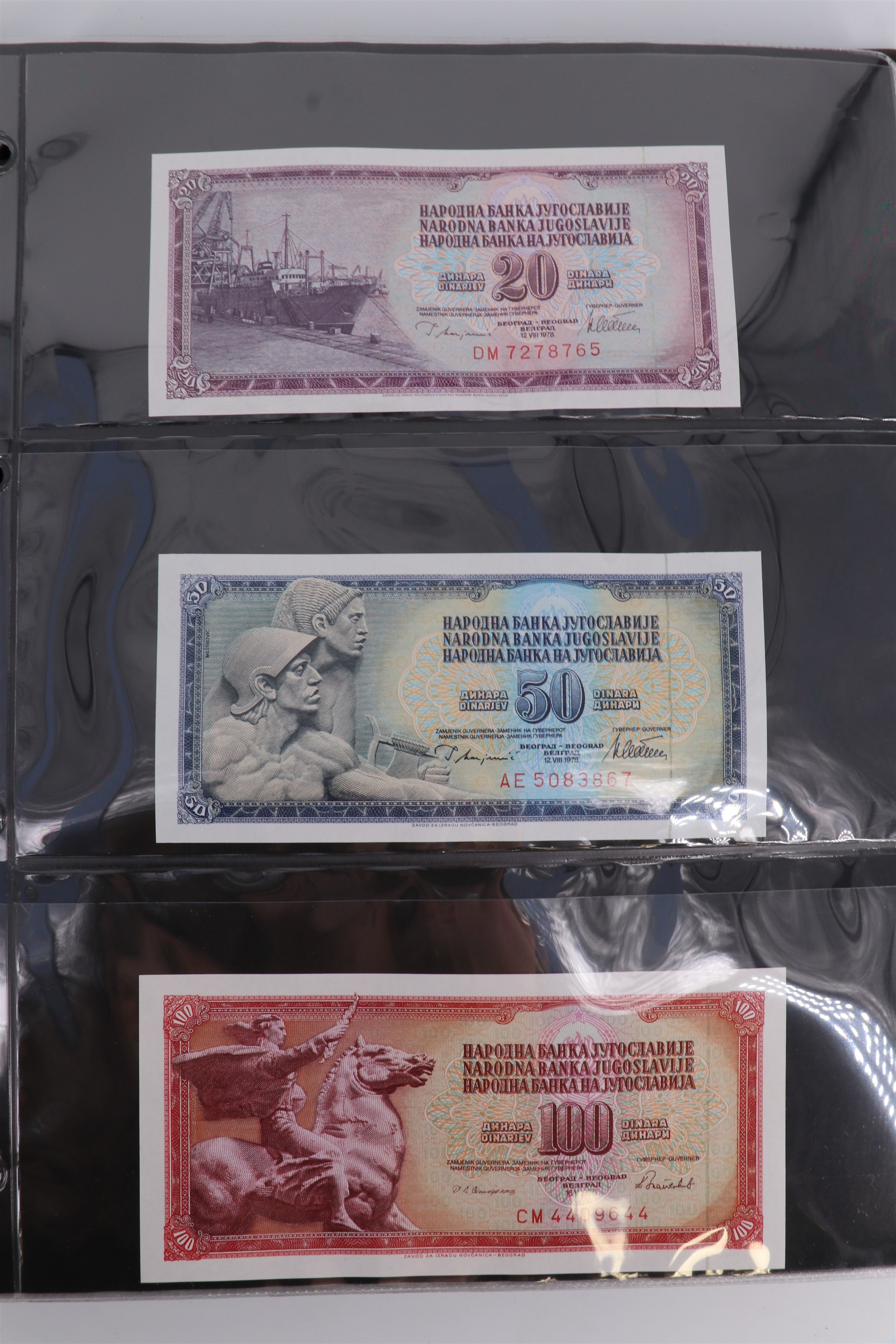 An album containing a collection of world banknotes, including Zaire (DR Congo), Ireland, - Image 38 of 87