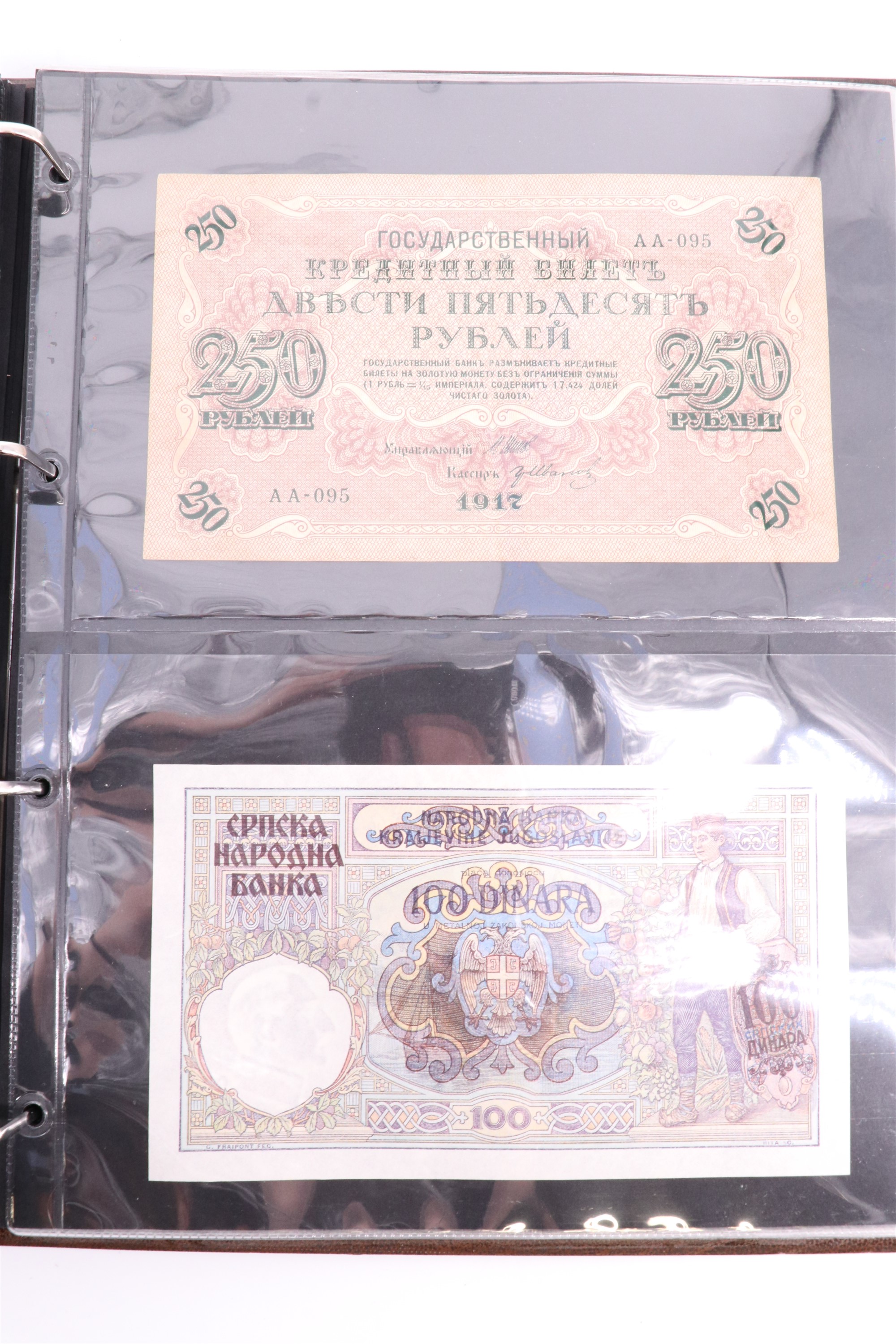 An album containing a collection of world banknotes, including Zaire (DR Congo), Ireland, - Image 70 of 87