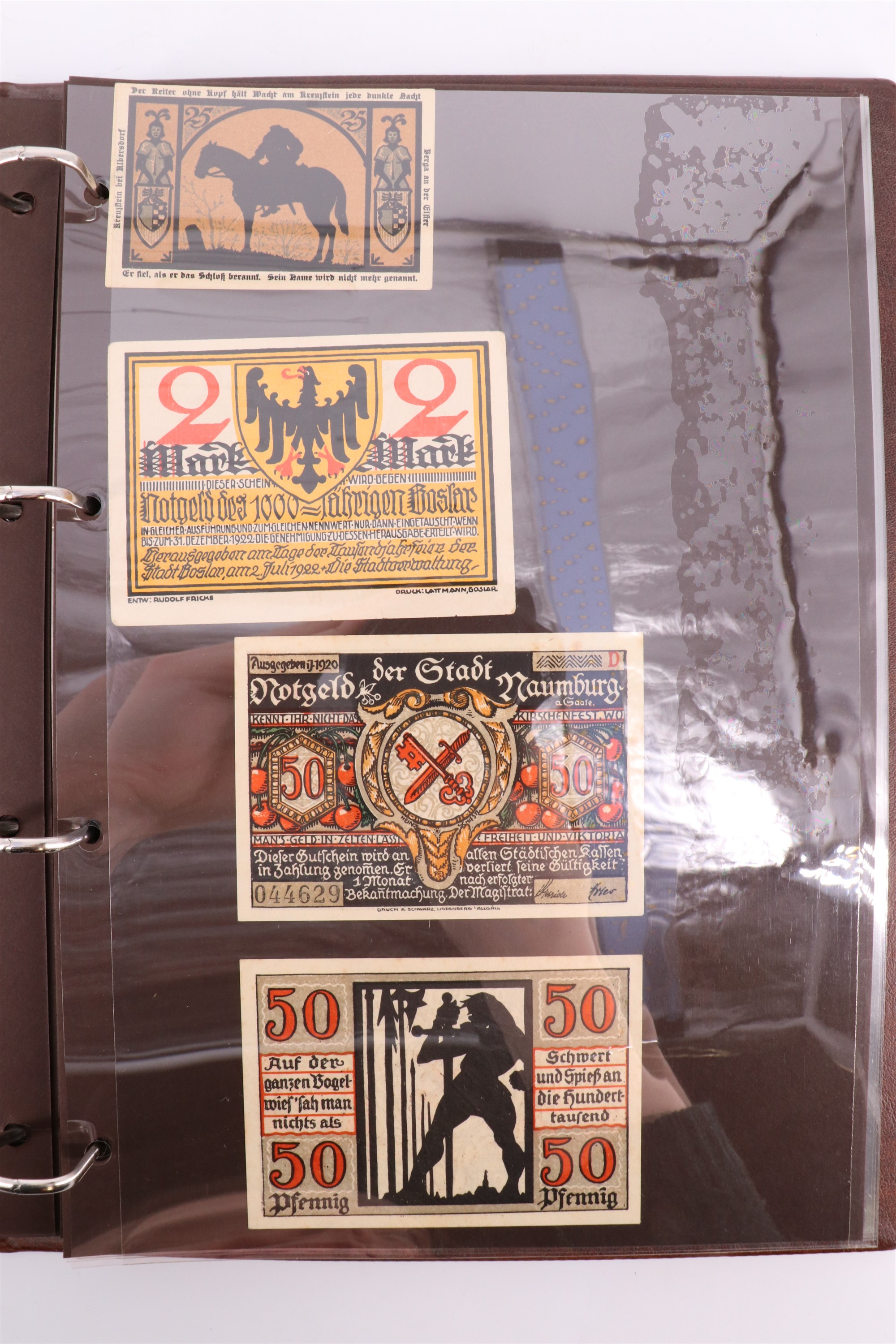 Two albums containing a collection of world banknotes, including German Notgeld, USA, Russia, New - Image 6 of 55