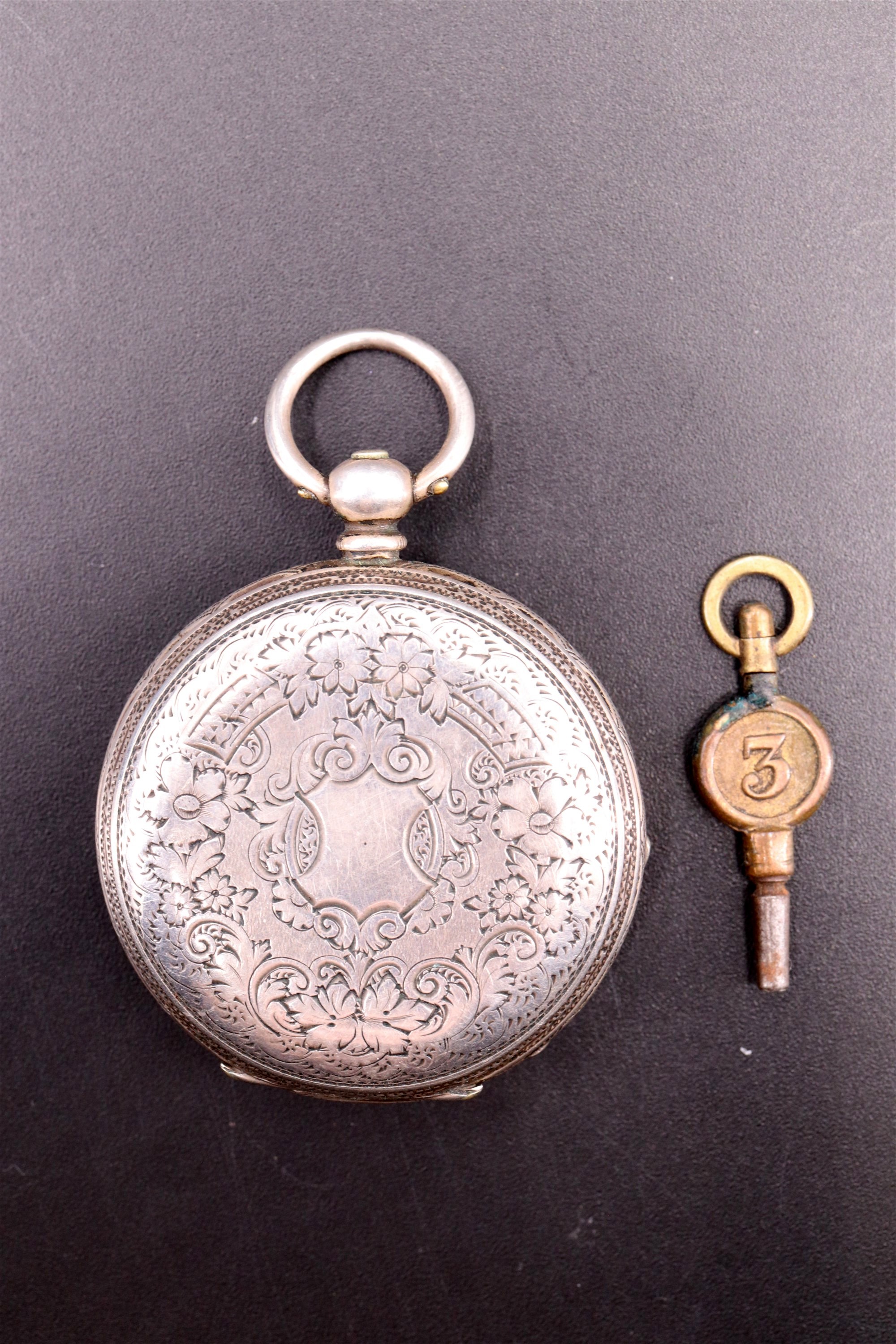 A late 19th Century Swiss white metal fob watch, having a key wind and set movement, a white - Image 2 of 4