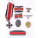 A small group of reproduction German Third Reich awards and insignia