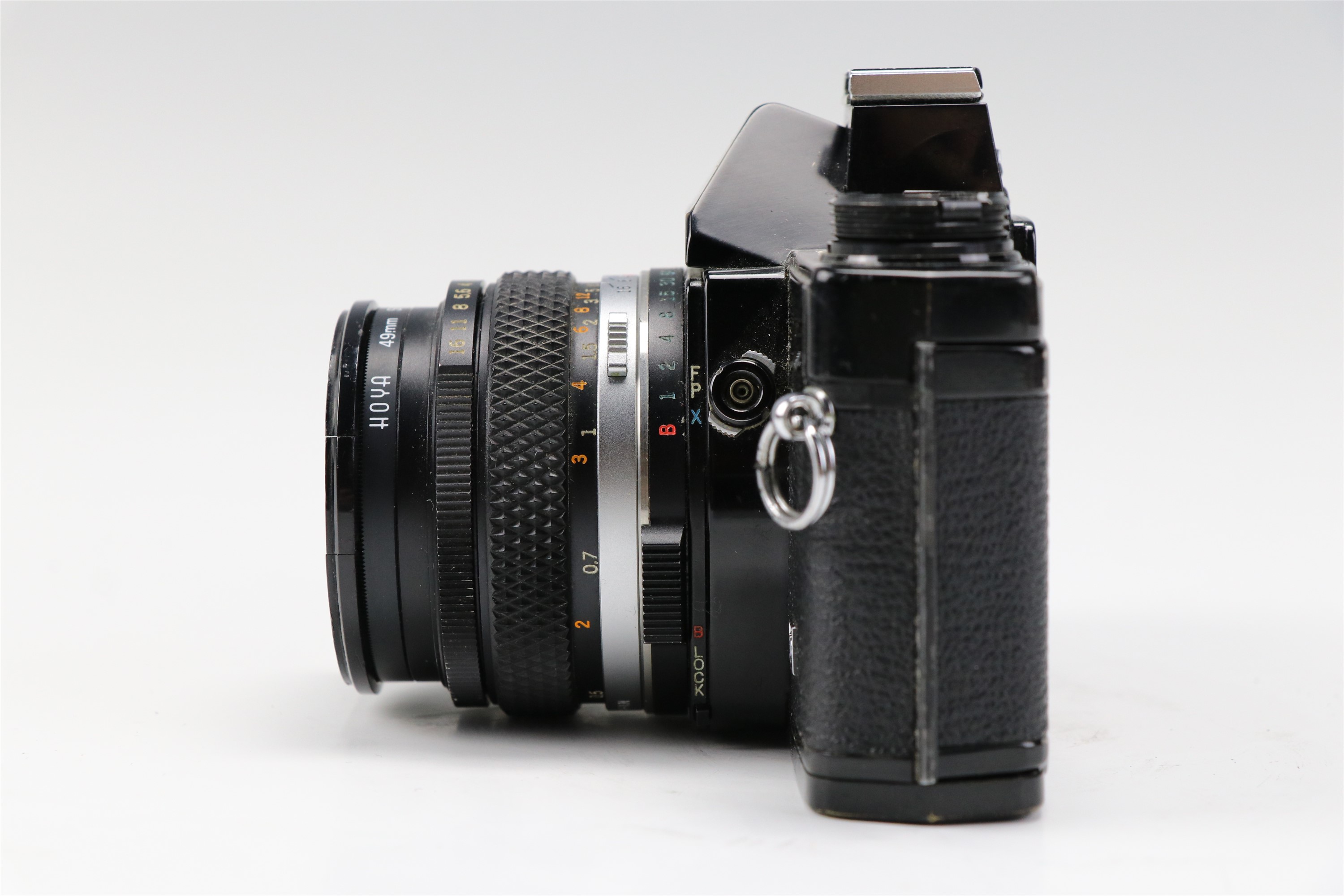 An Olympus OM-2 camera body together with a 1:1,8 f = 50mm lens, a Teleconverter 2X-A lens, a - Image 15 of 19