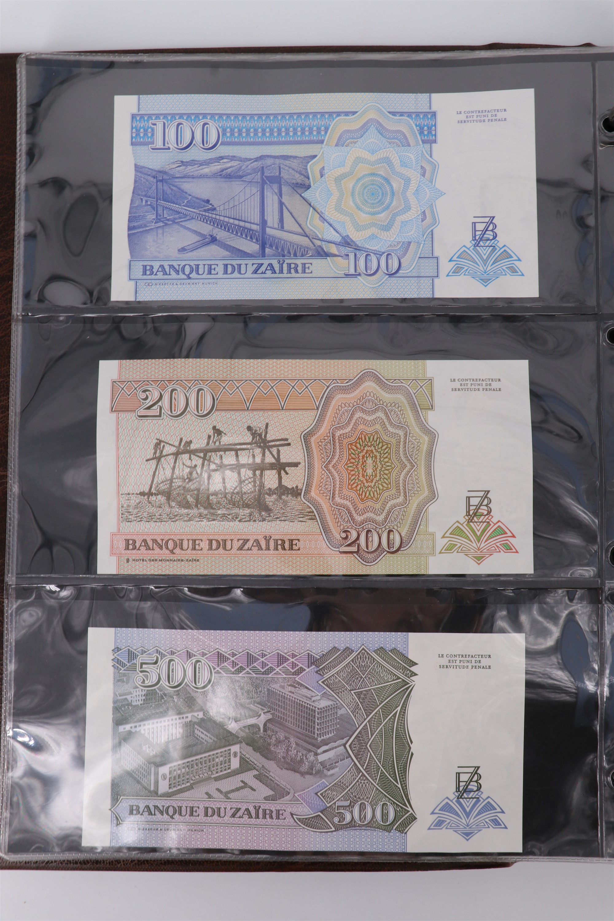 An album containing a collection of world banknotes, including Zaire (DR Congo), Ireland, - Image 9 of 87