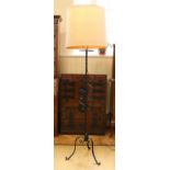 A wrought iron standard lamp, 155 cm to socket