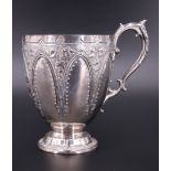 A Victorian silver oviform christening cup, bearing gothic repousse work and engraved foliate