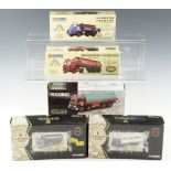 Five Corgi Classics diecast wagons including Guinness, Wynns, etc