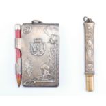 A Lourdes Grotto religious memento electroplate fob pencil and notepad