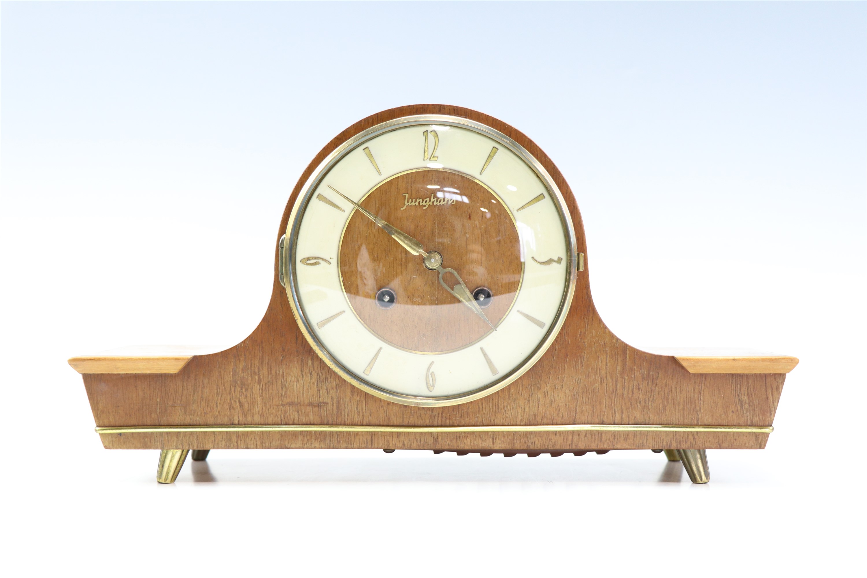 A 1960s Junghans walnut mantle clock, having a two train movement, striking on a gong, 32 x 9 x 17