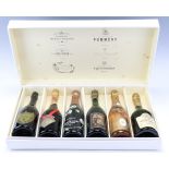 A Relais & Chateaux cased collection of vintage Champagne, comprising Moet et Chandon "Cuvee Dom