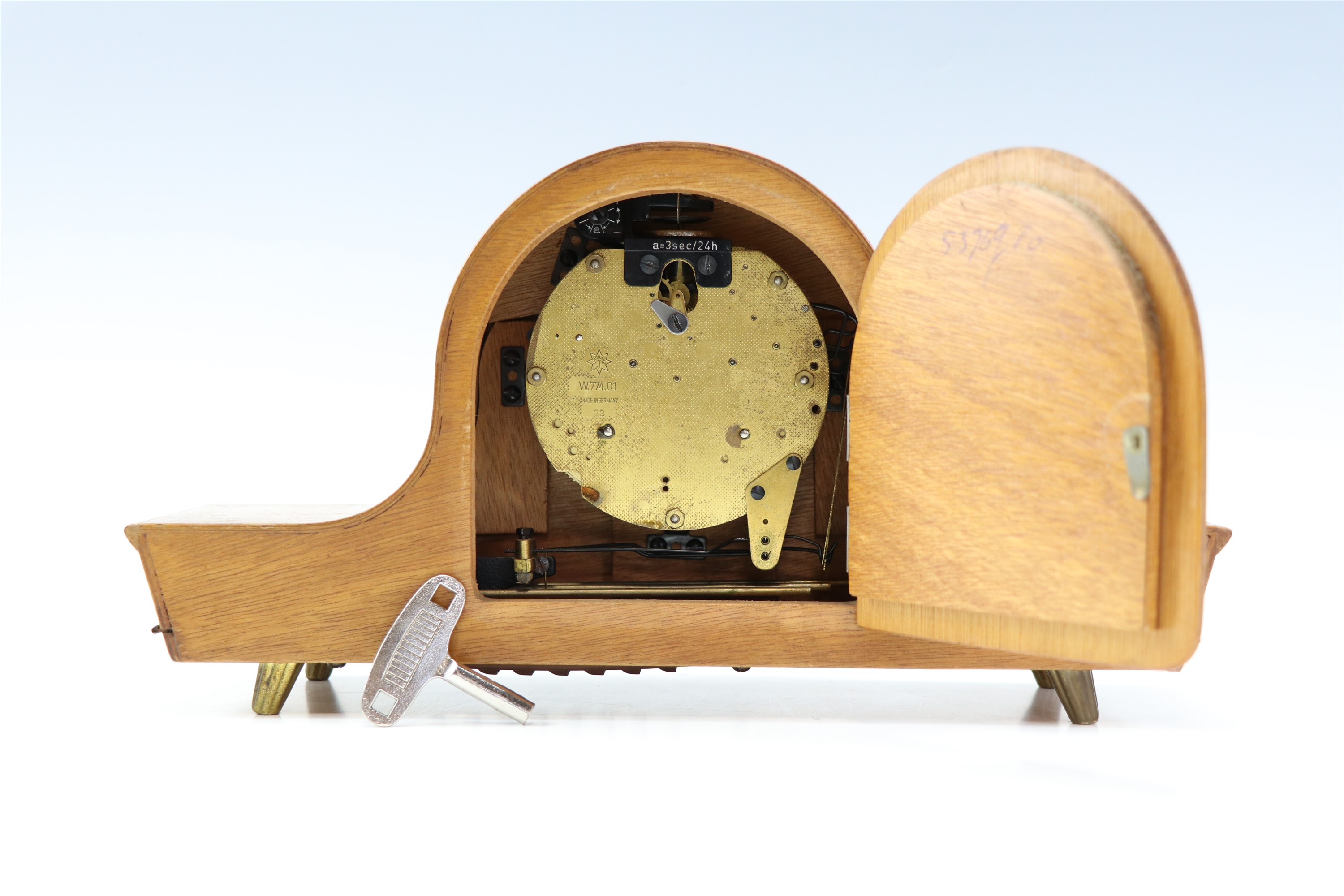 A 1960s Junghans walnut mantle clock, having a two train movement, striking on a gong, 32 x 9 x 17 - Image 3 of 3