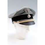 A reproduction German Third Reich Waffen SS officer's peaked cap