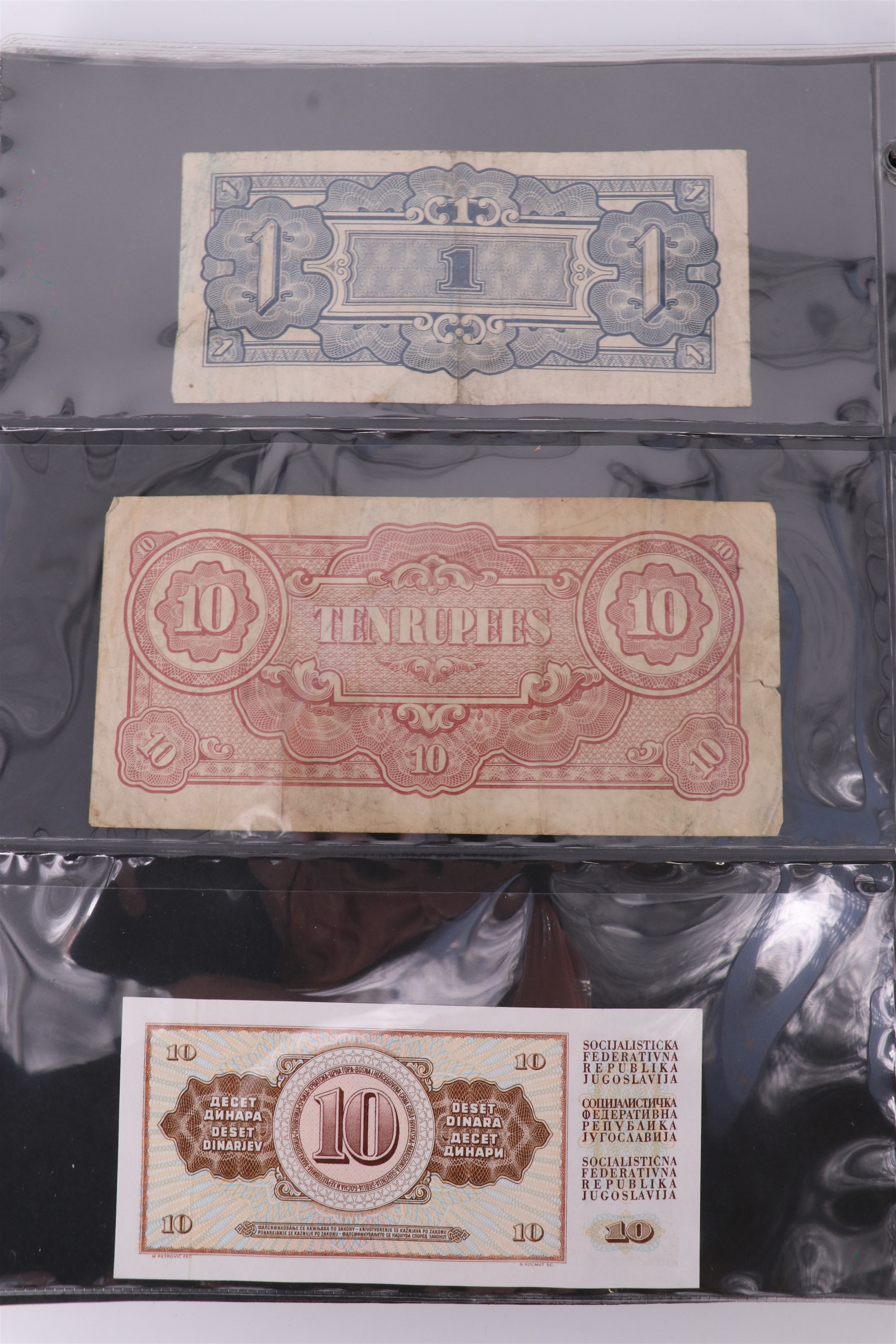 An album containing a collection of world banknotes, including Zaire (DR Congo), Ireland, - Image 37 of 87