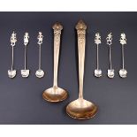 A set of six Siamese / Eastern white metal teaspoons together with two similar electroplate