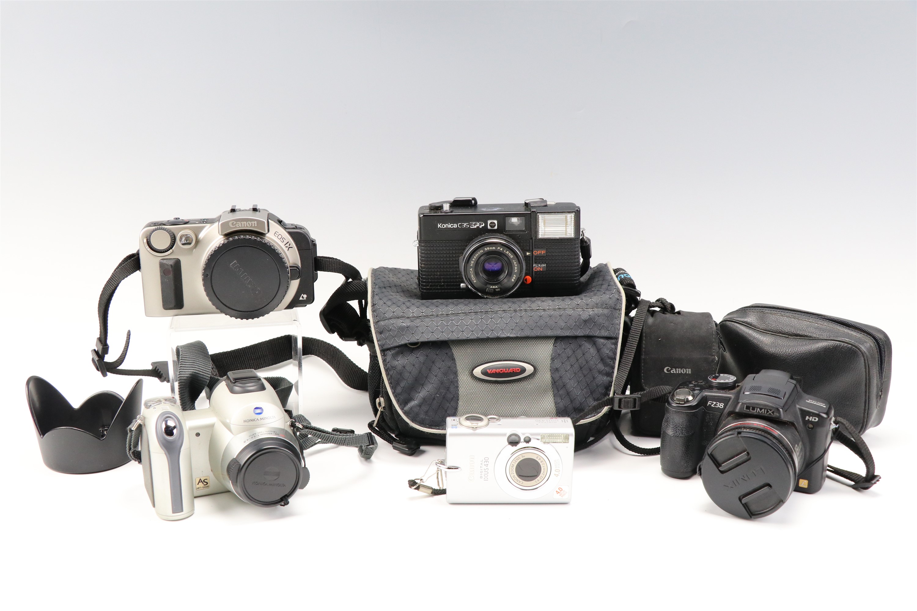 Lumix F238 HD, Canon EOS IX, Canon Digital IXUS 430, Konica Minolta Dimage 25 and Konica C35 EFP