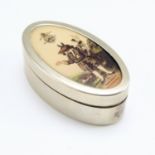 A navette shaped small nickel silver box, the top decorated with Winchester college's 'Trusty