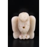 A Chinese carved jade toggle on the form of a phoenix, 3 cm