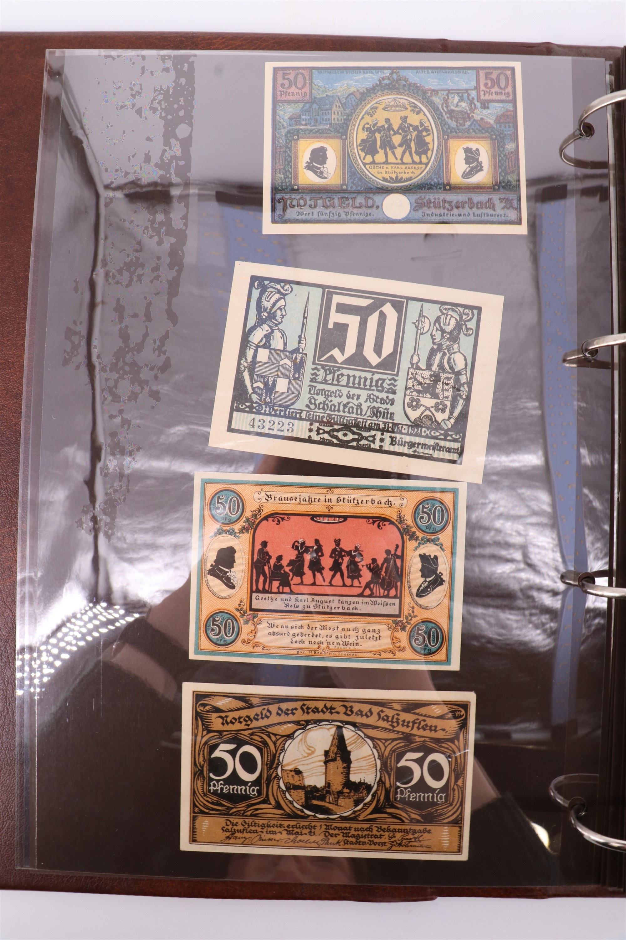 Two albums containing a collection of world banknotes, including German Notgeld, USA, Russia, New - Image 5 of 55