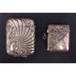 An Edwardian silver vesta case, decorated with engraved foliate scrolls and flowers, Henry