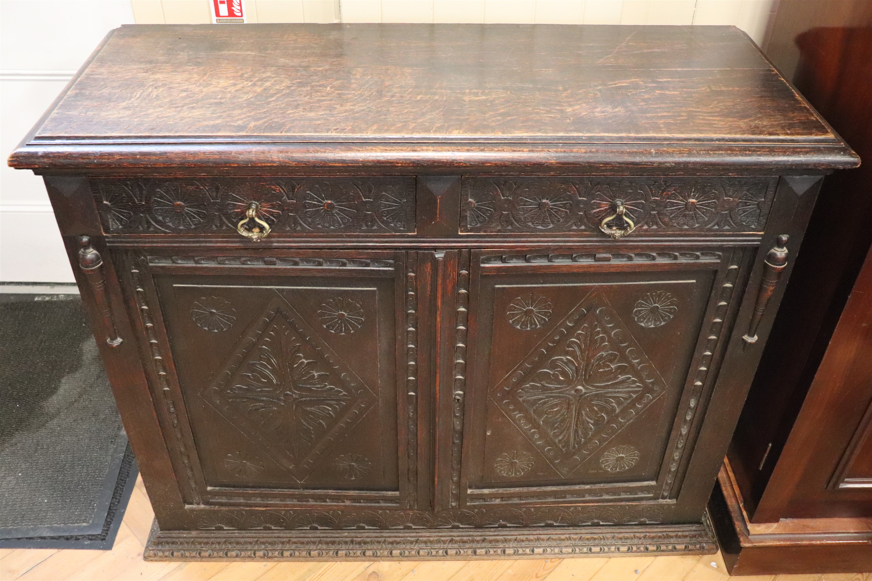 A late 19th / early 20th Century carved oak side cabinet, 130 cm x 49 cm x 101 cm - Image 2 of 5