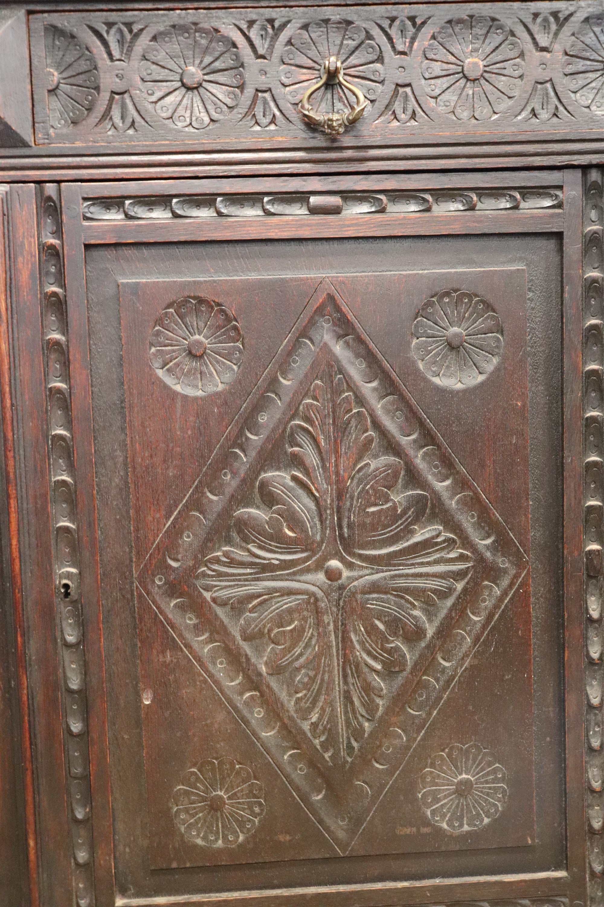 A late 19th / early 20th Century carved oak side cabinet, 130 cm x 49 cm x 101 cm - Image 4 of 5
