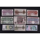 A group of Bank of England banknotes including five Peppiatt one pound notes and a ten shillings, an