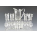 An early 20th Century pressed glass lemonade set together with six cordial glasses, jug 18.5 cm