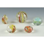 Five paperweights, tallest 8 cm