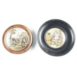Two Victorian framed Prattware pot lids comprising The Village Wedding, and The Times, former 10.5