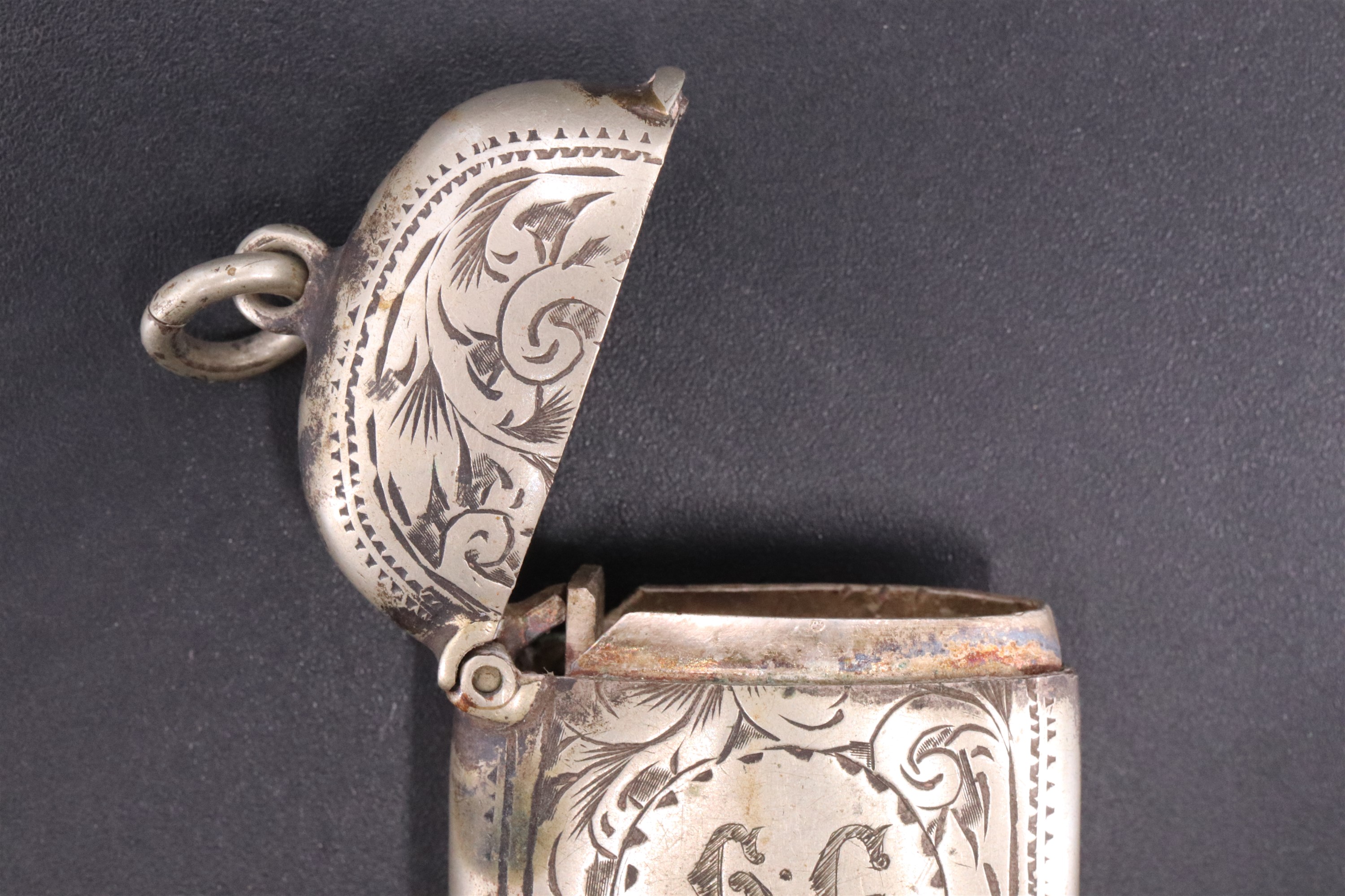 A Victorian silver vesta case, decorated with engraved foliate scrolls, William J Holmes, - Image 4 of 4