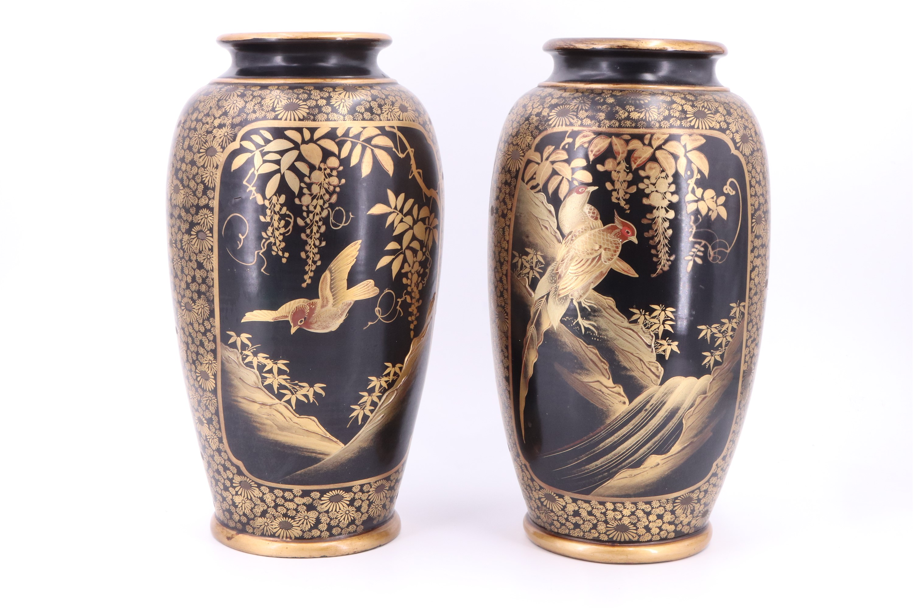 A pair of late Meiji / Taisho Japanese oviform vases, raised-gilt decorated in depiction of birds