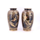 A pair of late Meiji / Taisho Japanese oviform vases, raised-gilt decorated in depiction of birds