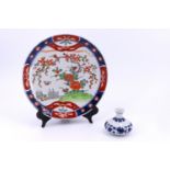 A Chinese Imari pallet plate, impressed mark verso, together with a blue and white vase, bearing