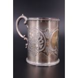 A Victorian silver christening cup, of subtly tapering cylindrical form, having a compound scroll