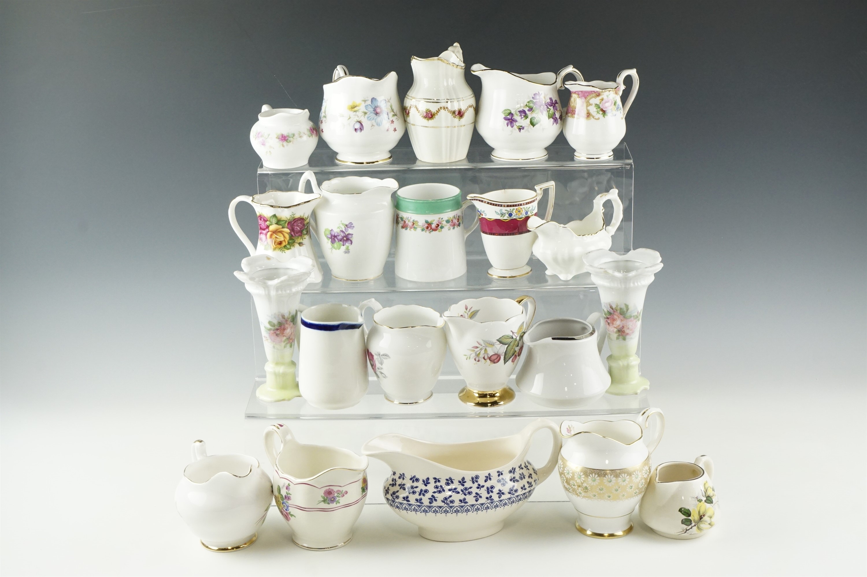 A large collection of jugs, including Tuscan, Duchess, Weston, Minton, etc, tallest 12 cm