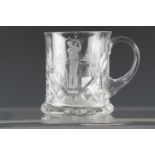 A cut glass tankard decorated with an acid etched golf scene, 10 cm