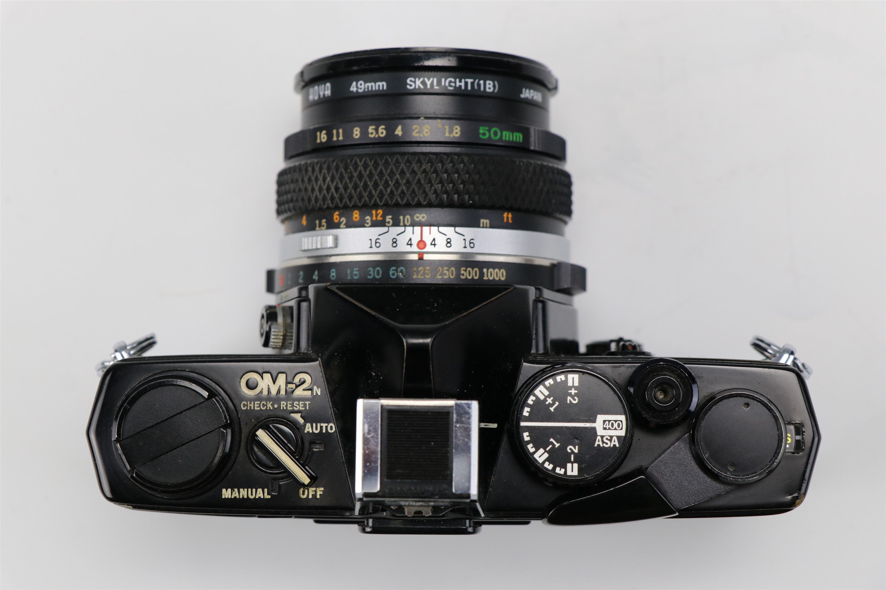 An Olympus OM-2 camera body together with a 1:1,8 f = 50mm lens, a Teleconverter 2X-A lens, a - Image 16 of 19