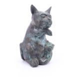 A cast bronze study of a seated cat, modelled with its paw up and a kitten clinging to its belly,