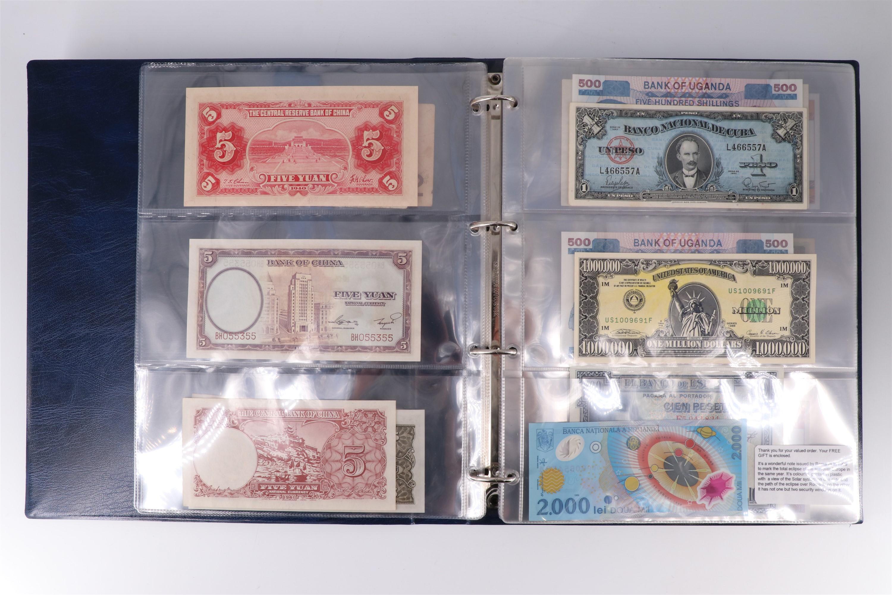 An album containing a collection of world banknotes, including Romania, Roman Empire, China, - Image 6 of 33