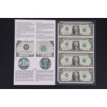 A USA Treasury Bureau of Engraving and Printing set of four uncut one dollar bills