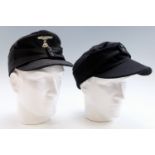 A reproduction German Third Reich Waffen SS panzer troops field cap together with a similar cap