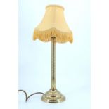 A brass columnar lamp, 38 cm to socket, [needs rewiring]