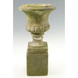 A vintage stone campana form garden urn on a pedestal base, 51 cm x 26 cm x 26 cm